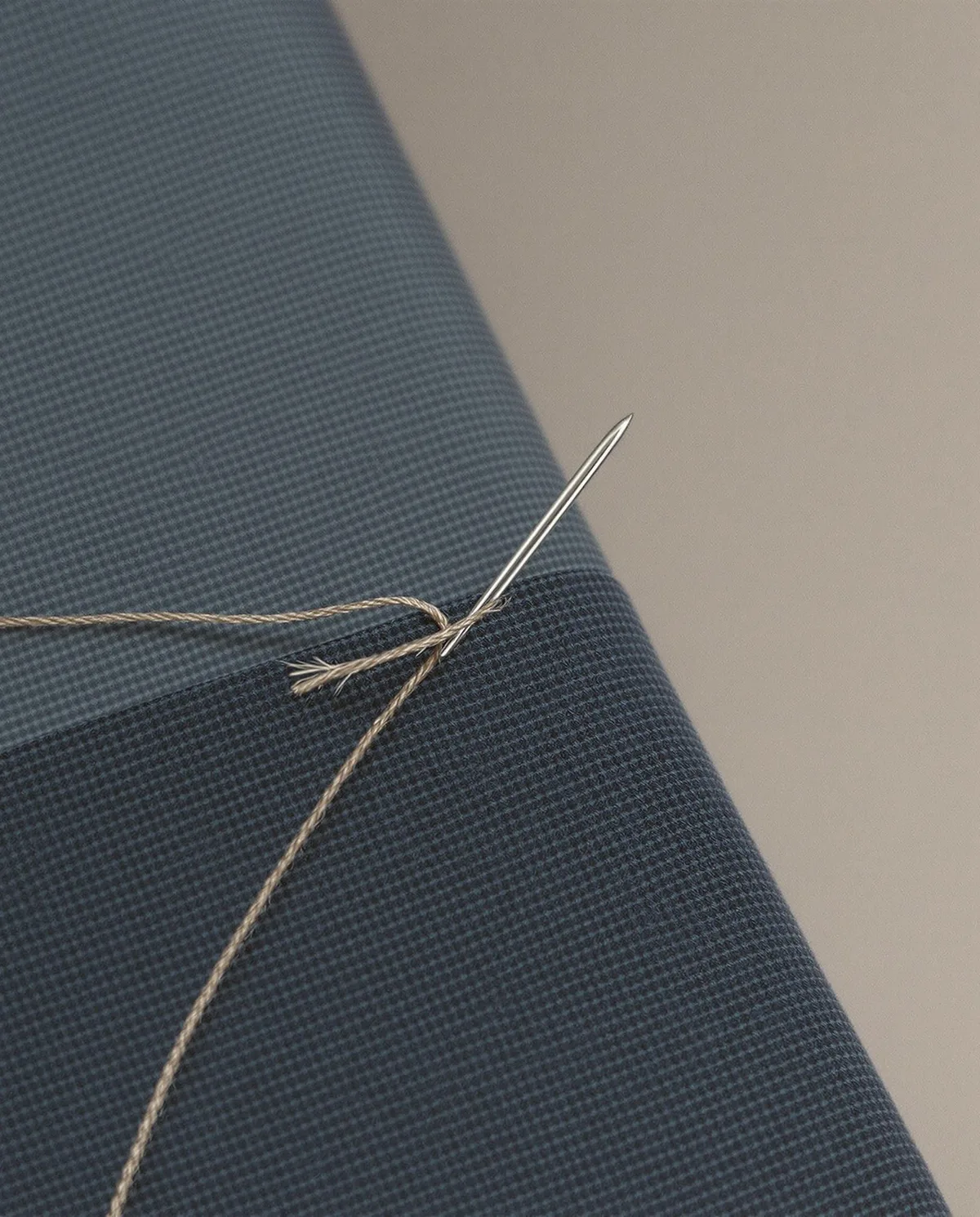 Tailoring tools on suit fabric